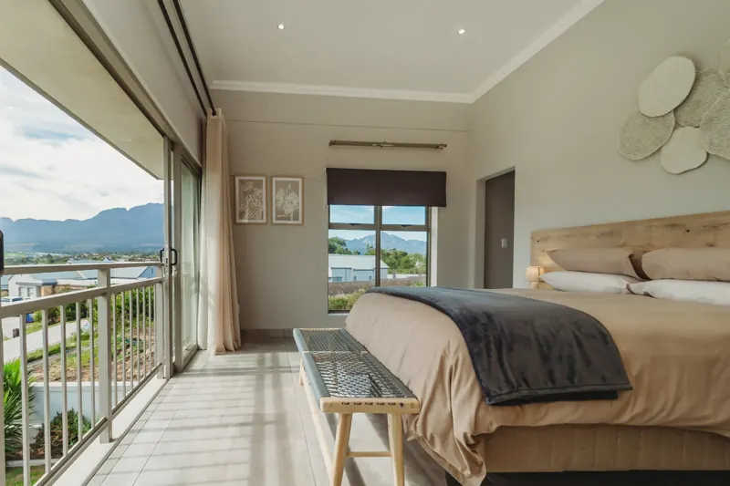 Bedroom opening to mountain views