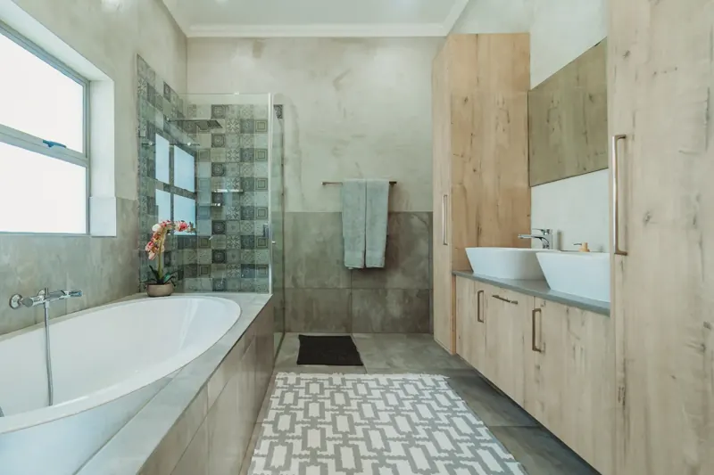 Bathroom with bath and separate shower