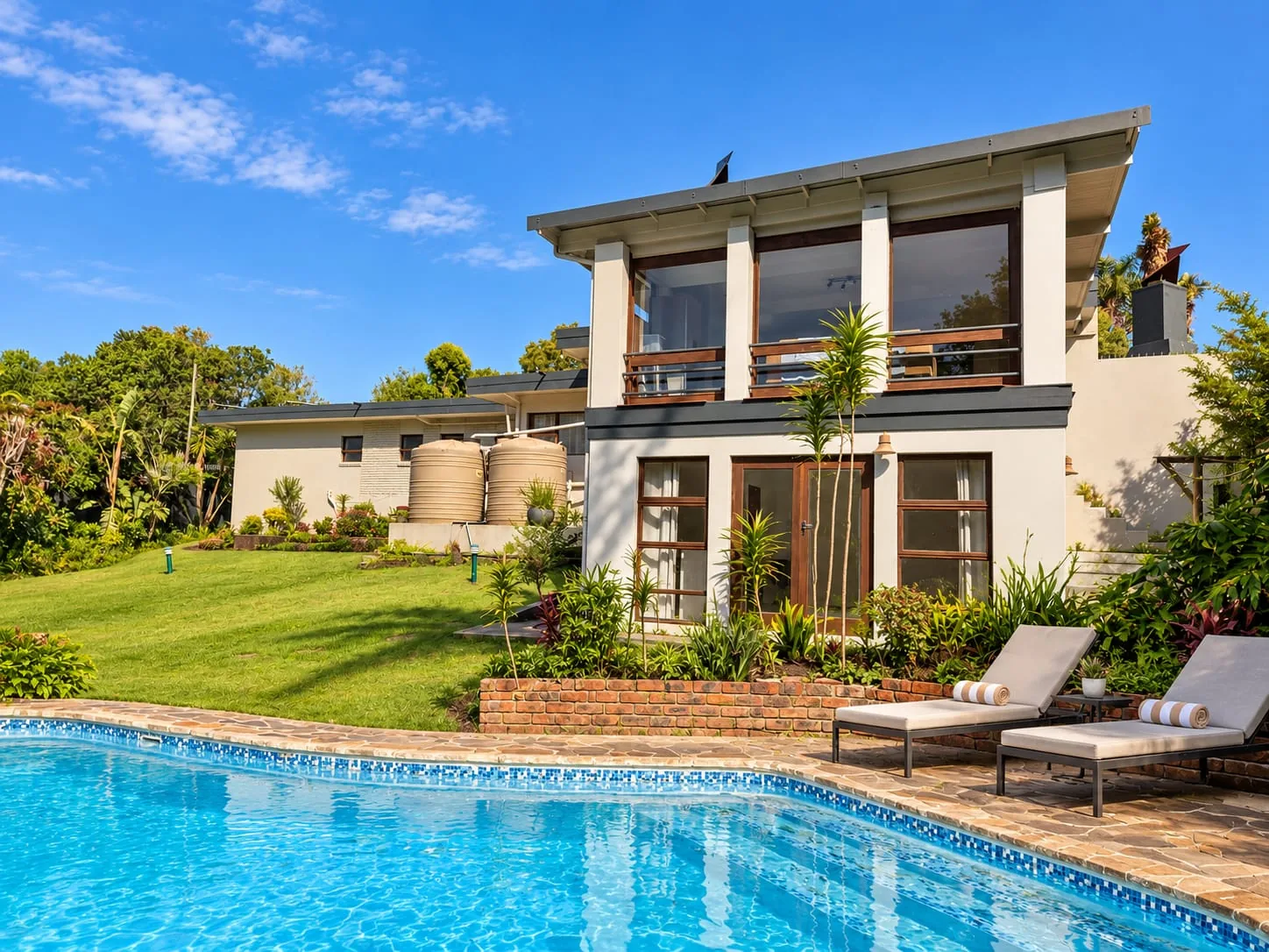 The Mountain House and swimming pool in its leafy George garden