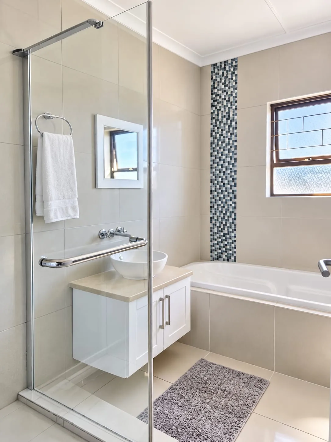 The Mountain House — Bathroom with bath and shower
